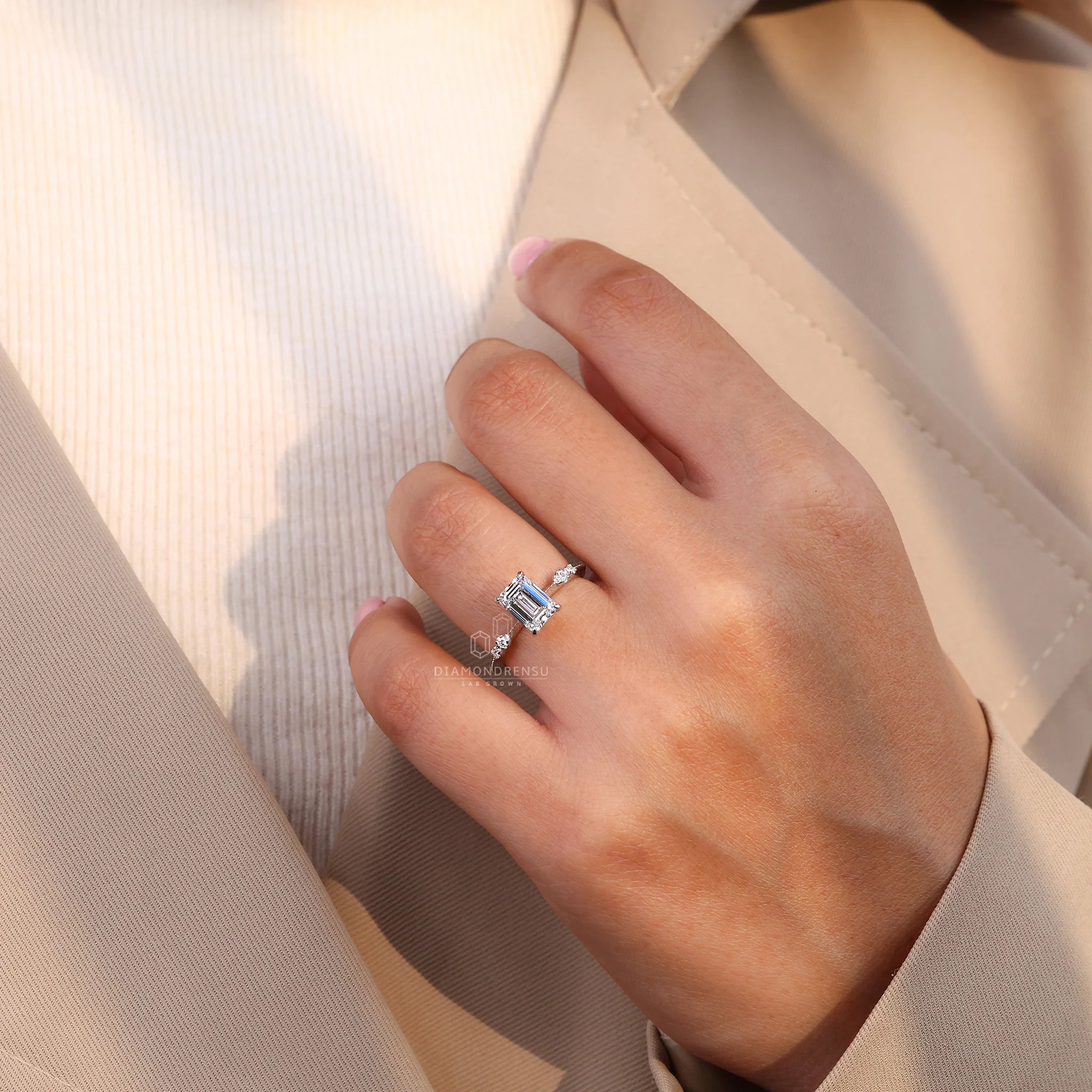 White Gold Emerald Ring With Knife Edge Shank Band