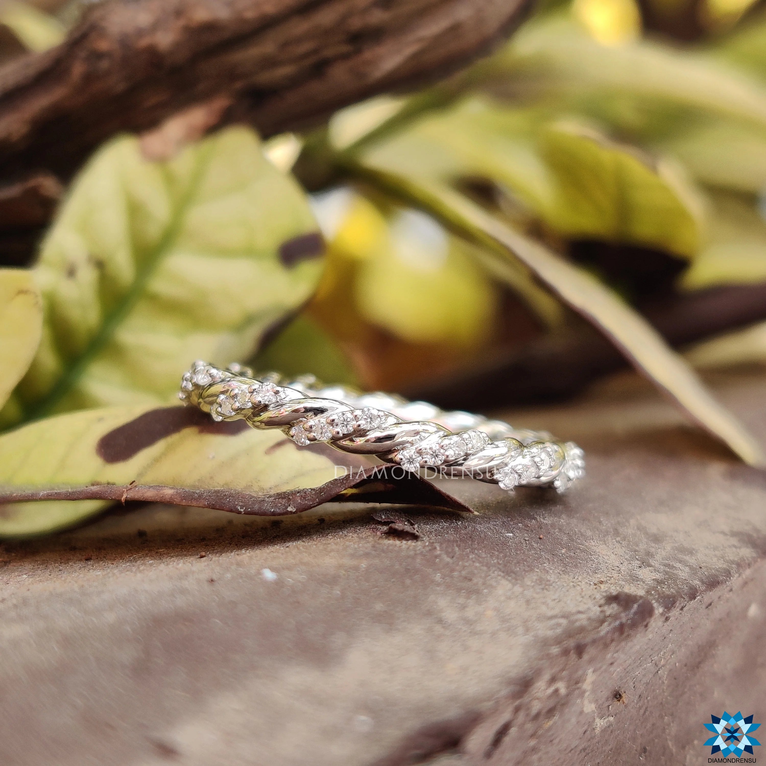 Contemporary Twisted Pave Shank Moissanite Eternity Wedding Band