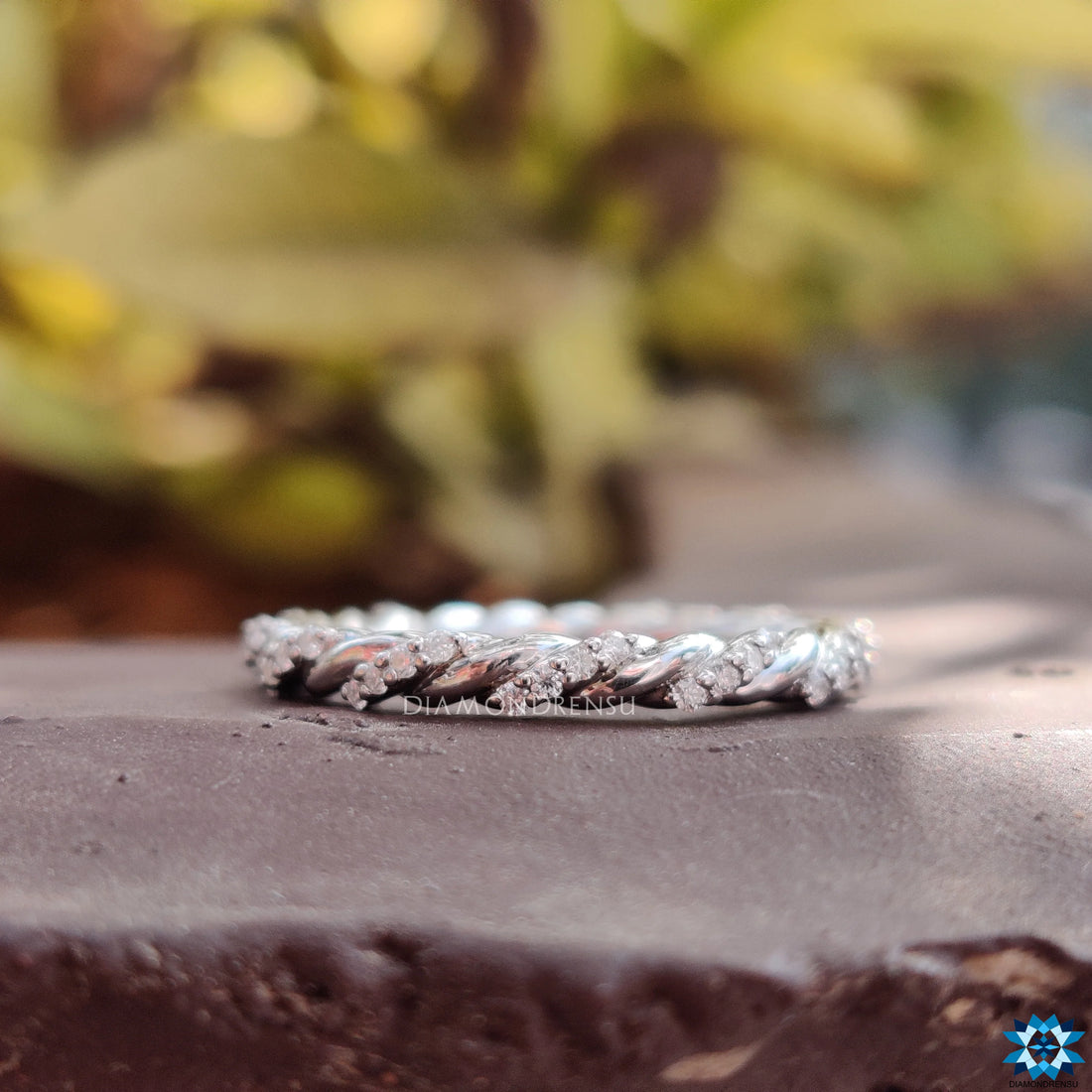 Contemporary Twisted Pave Shank Moissanite Eternity Wedding Band