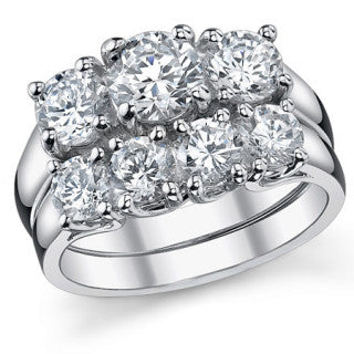 1.75ct (6mm/5mm) Round Brilliant Moissanite Trellis 3 Stone Ring